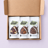 Geopend bedankt geschenkpakket met drie zakjes chocolade