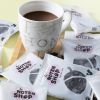 Hot chocolate puur 15 x 40 gram mok met zakjes ernaast