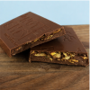 Chocoladereep deluxe melk / chips 175 gram vanbinnen