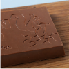 Chocoladereep deluxe melk / chips 175 gram van dichtbij