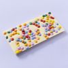 Witte chocolade met gekleurde smarties