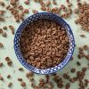 Gepofte spelt met cacao in schaaltje