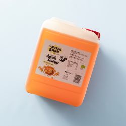 Biologische agavesiroop in een jerrycan van 5000 ml op een lichtblauwe achtergrond