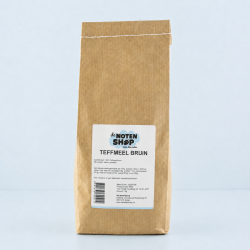Teffmeel bruin in een papieren zak