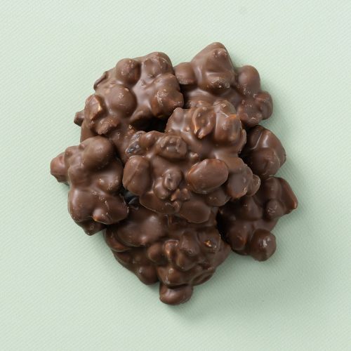 Ambachtelijke pinda/rozijnen rotsjes melk