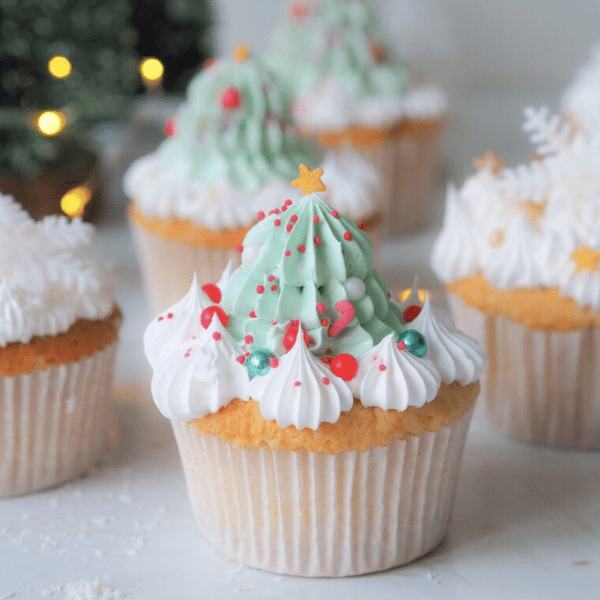 Kerst cupcakes met sinaasappel en lemon meringue crème.