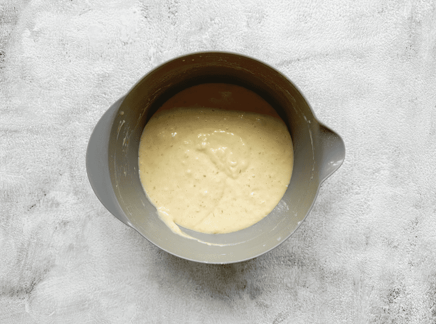 Romige beslag voor de sinaasappelcake